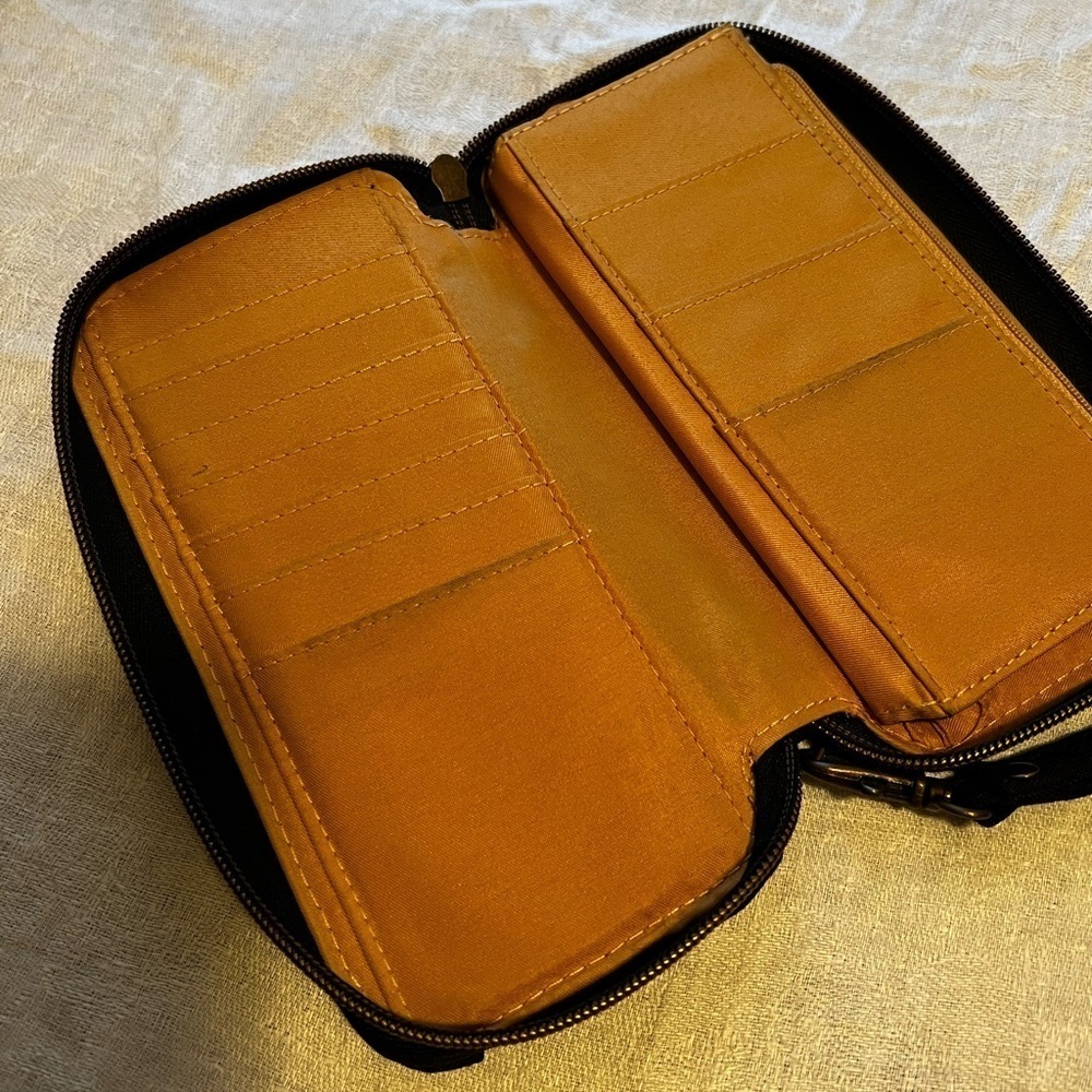 Travelon wallet in black. Zipper close. Wristlet strap. Great for travel. - Picture 5 of 6